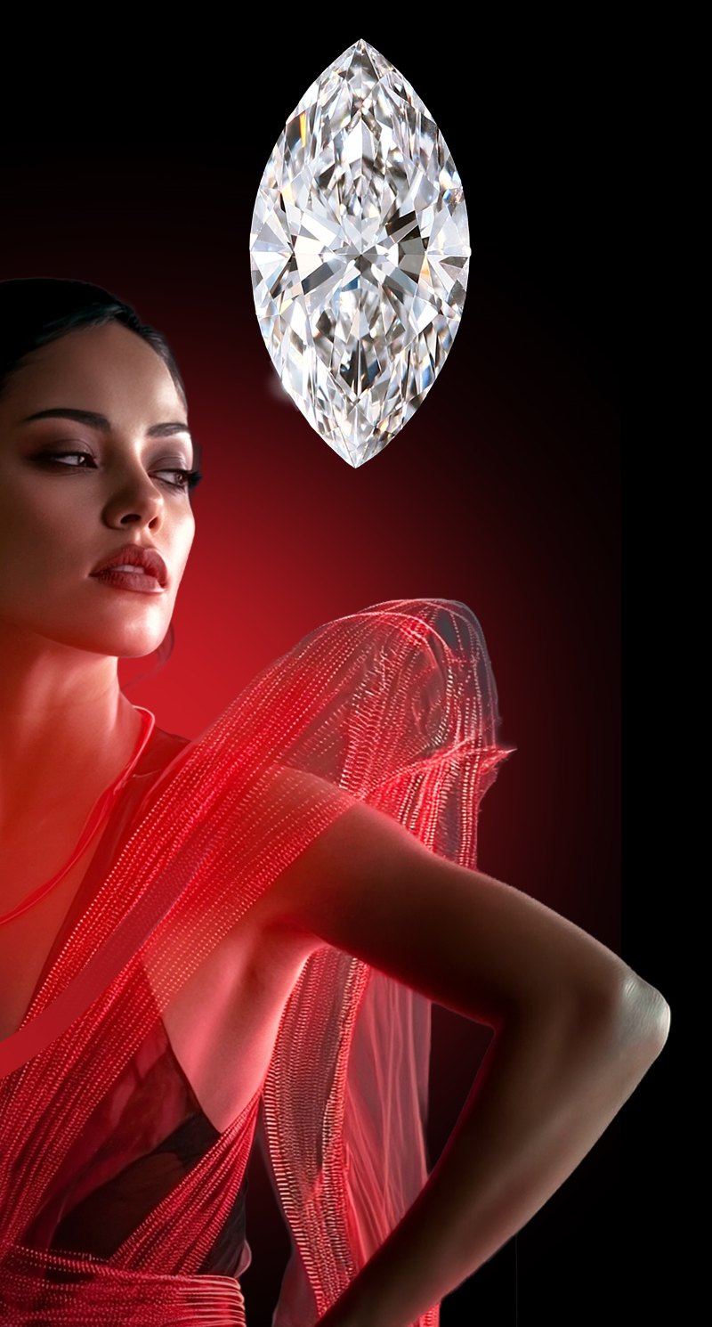 Woman in a red gown beside a marquise diamond